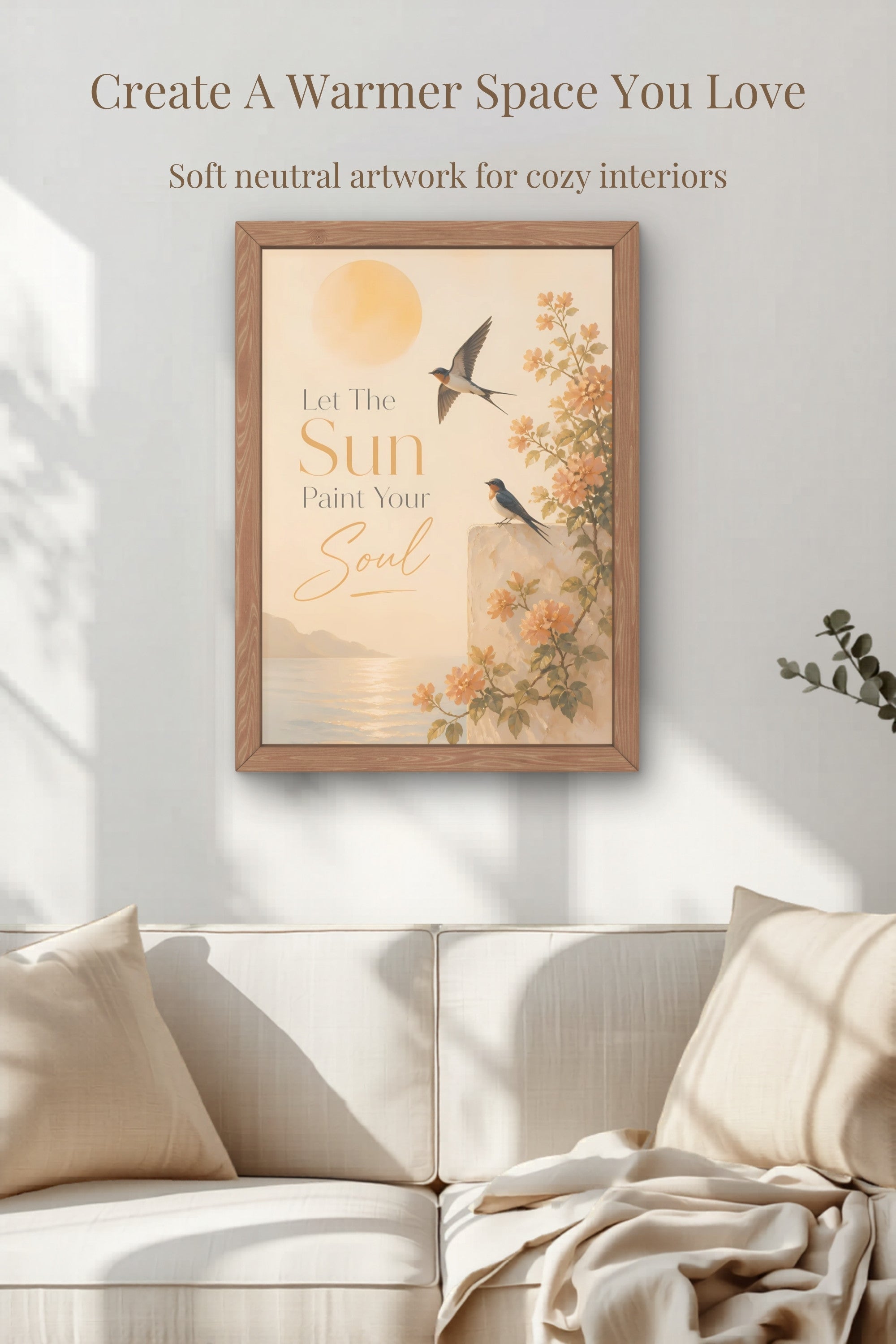 Warm neutral bird typography wall art print displayed above a cozy sofa in a Scandinavian inspired living room with soft beige decor